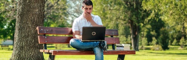 person sitting on a bench