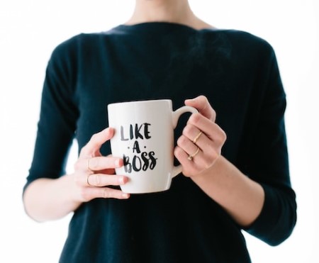 Woman Holding a Mug